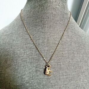 Delicate gold tone elephant pendant necklace